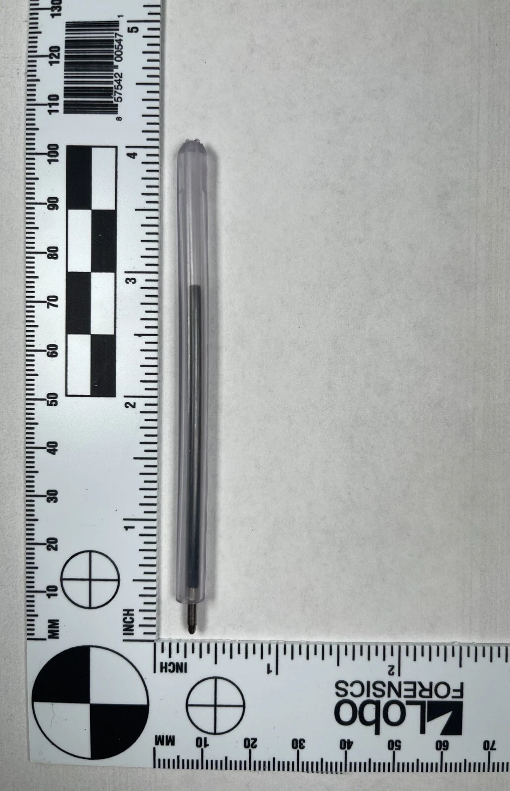 Flexible safety pen shown beside a forensic measurement scale at approximately four inches long